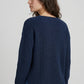 Back view of women’s navy fisherman sweater featuring textured knit construction and relaxed everyday fit.