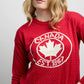 Front view of Sweater 1867 featuring knit fabric with dotted detailing and bold maple leaf crest design with Canada EST. 1867 text.