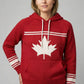 Person wearing a red hoodie with a white maple leaf design on a gray background